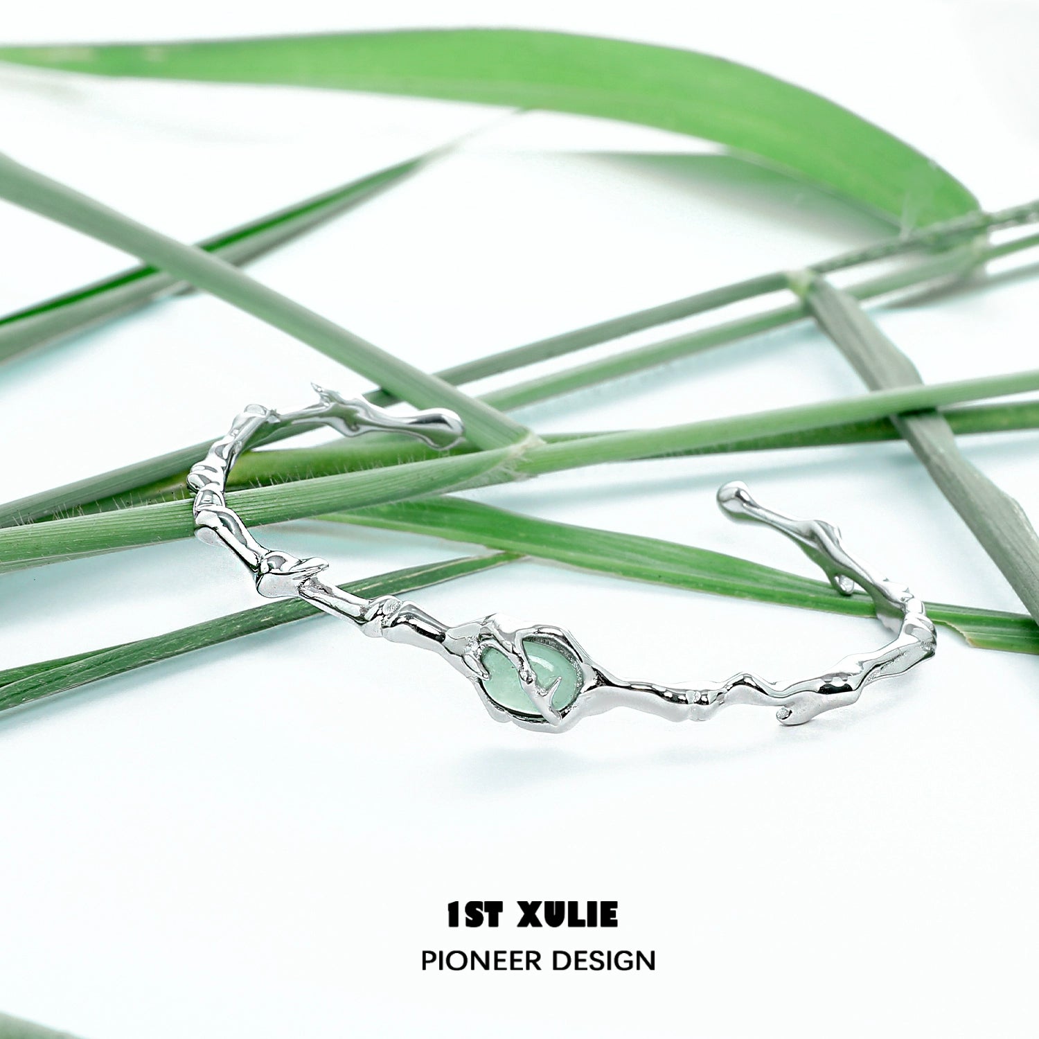 Jade bamboo silver bracelet featuring a unique design with a natural bamboo shape