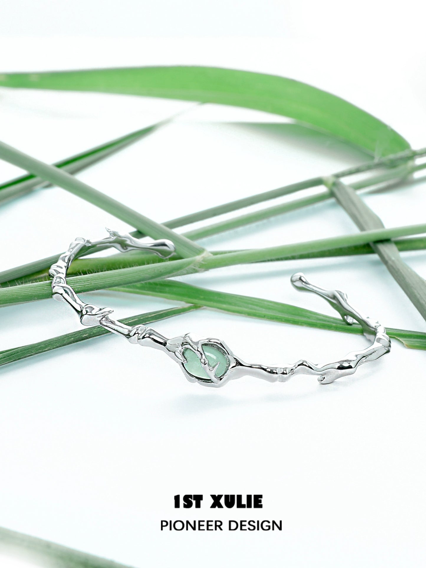 Jade bamboo silver bracelet featuring a unique design with natural jade accents