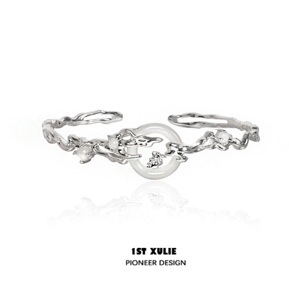 Elegant jade rabbit white agate silver bracelet featuring intricate design and polished finish