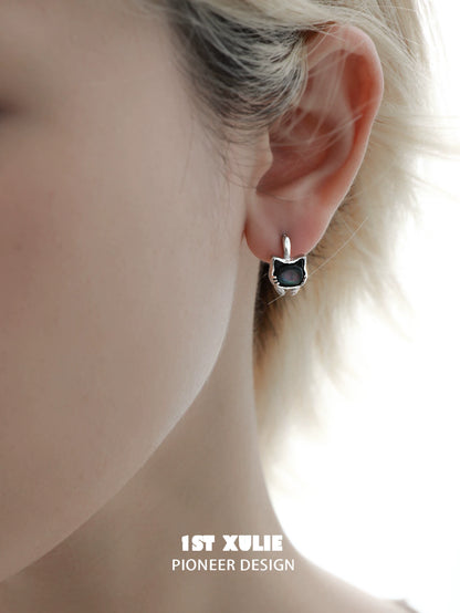 Silver kitten stud earrings featuring a cute cat face design for animal lovers