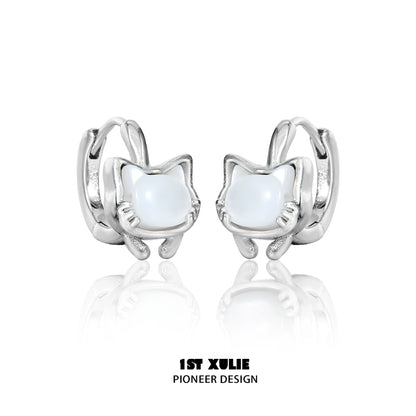 Cute kitten stud earrings in silver with a glossy white stone for playful animal lovers