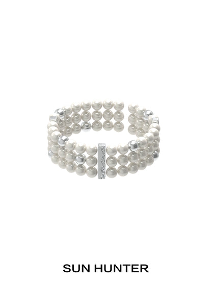 SUN HUNTER layered pearl bracelet with multiple strands of elegant pearls for a stylish look