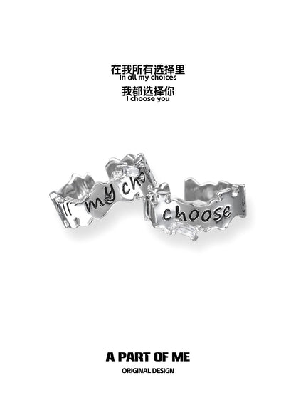 Silver letter couple rings featuring the phrase I choose you for romantic couples