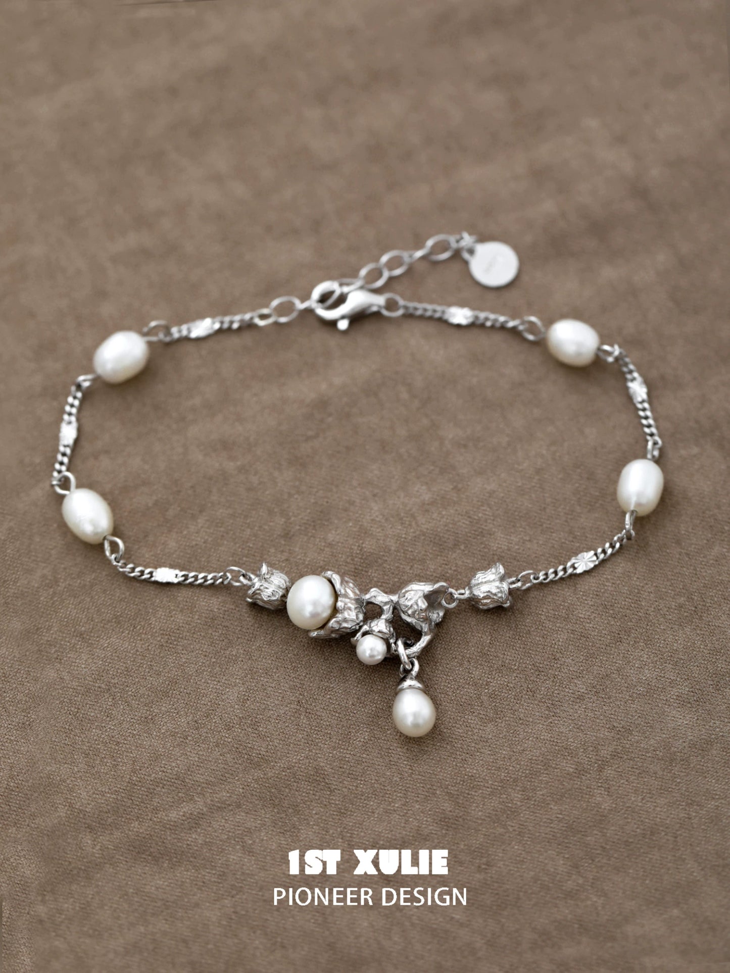 Elegant lily of the valley pearl bracelet featuring silver accents and a delicate design