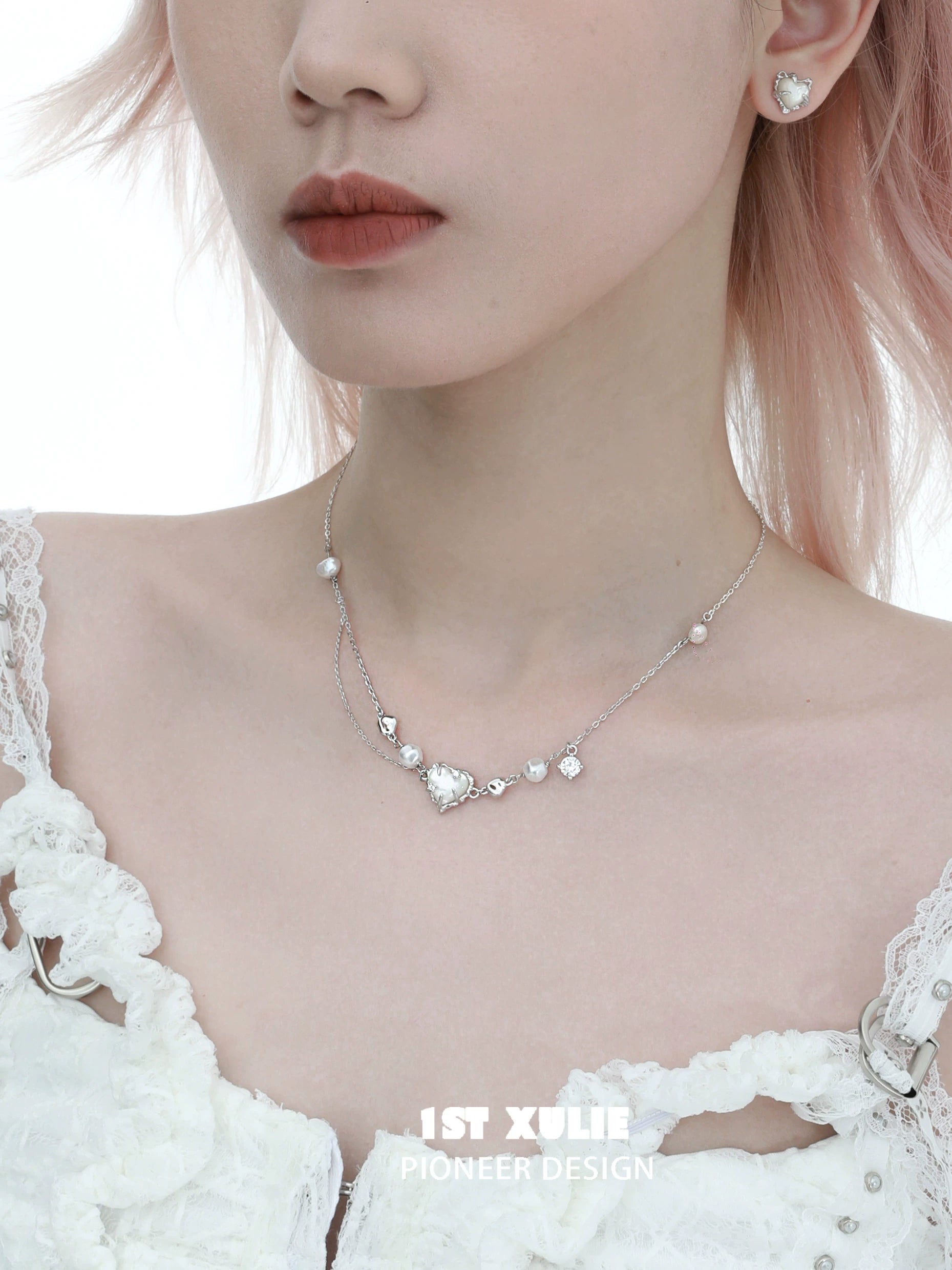 Love fritillary silver necklace featuring elegant heart and pearl accents for a chic look