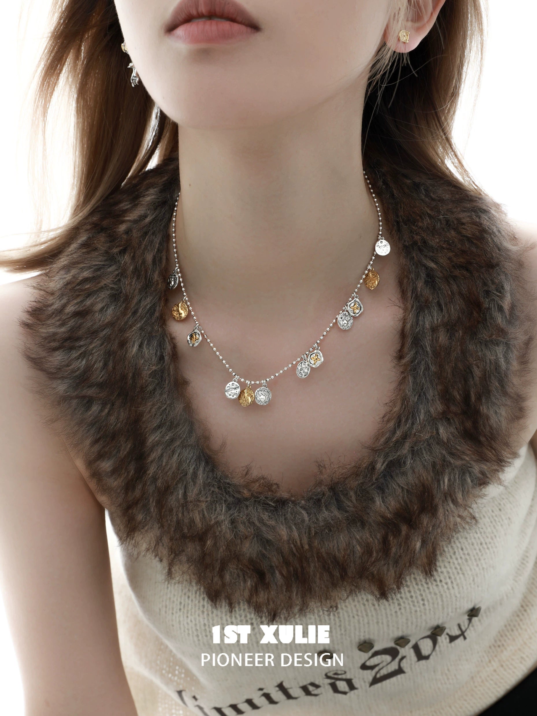 Elegant lucky cat charm necklace featuring silver and gold accents, perfect for cat lovers and charm collectors