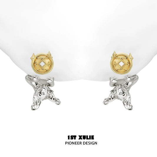 Lucky coin cat stud earrings in silver and gold design for unique fashion statement