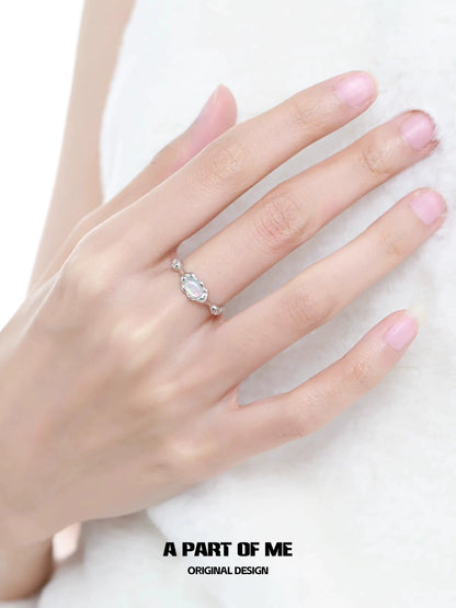 Elegant mermaid opal ring by A PART OF ME featuring sparkling stones on a delicate band