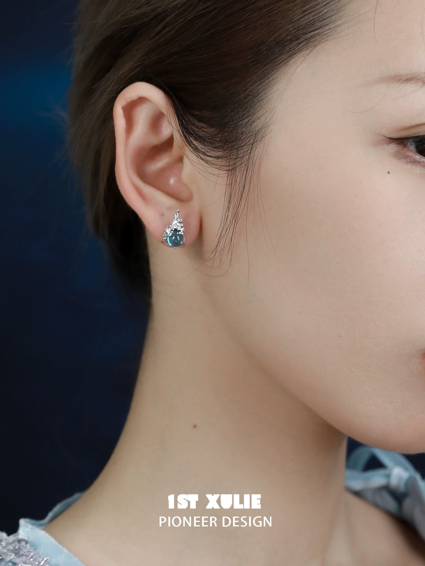 Elegant mermaid tear earrings featuring a blue gemstone design perfect for any occasion