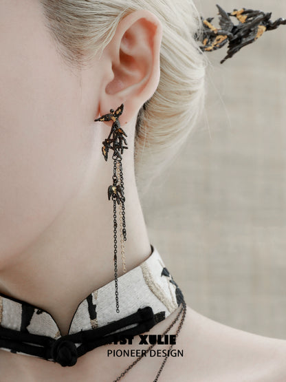 Midnight swallow gothic earrings with intricate design and dangling accents for a unique fashion statement