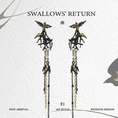 Midnight swallow gothic earrings featuring intricate bird designs and cascading chains for a bold look