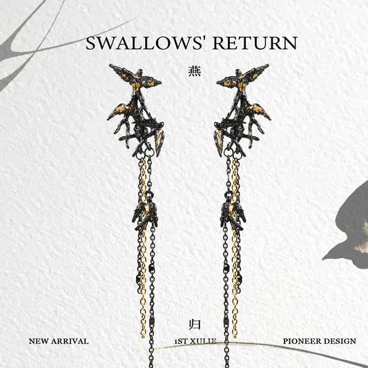 Midnight swallow gothic earrings featuring intricate bird designs and cascading chains for a bold look