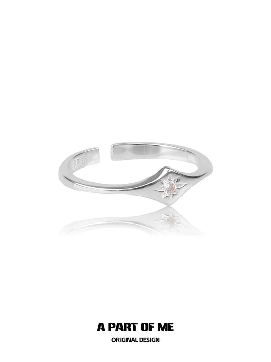 Minimalist lotus silver ring with elegant design and delicate stone placement for a stylish look
