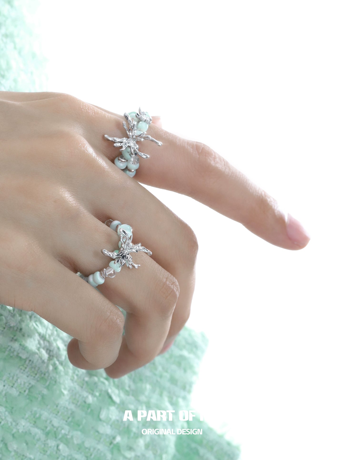 Mint butterfly beaded ring featuring delicate silver accents and charming design for a trendy look