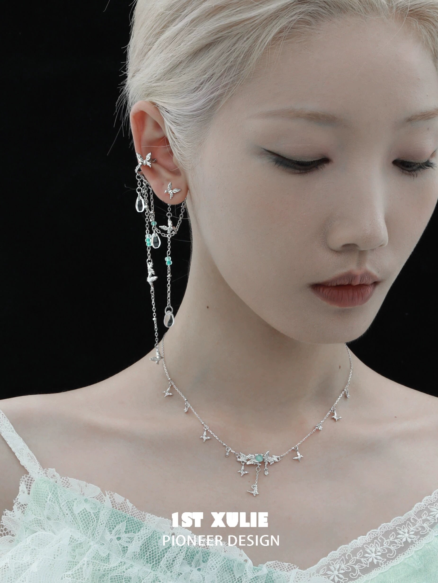 Elegant mint butterfly necklace by 1STXULIE with delicate butterfly charms and a shimmering design