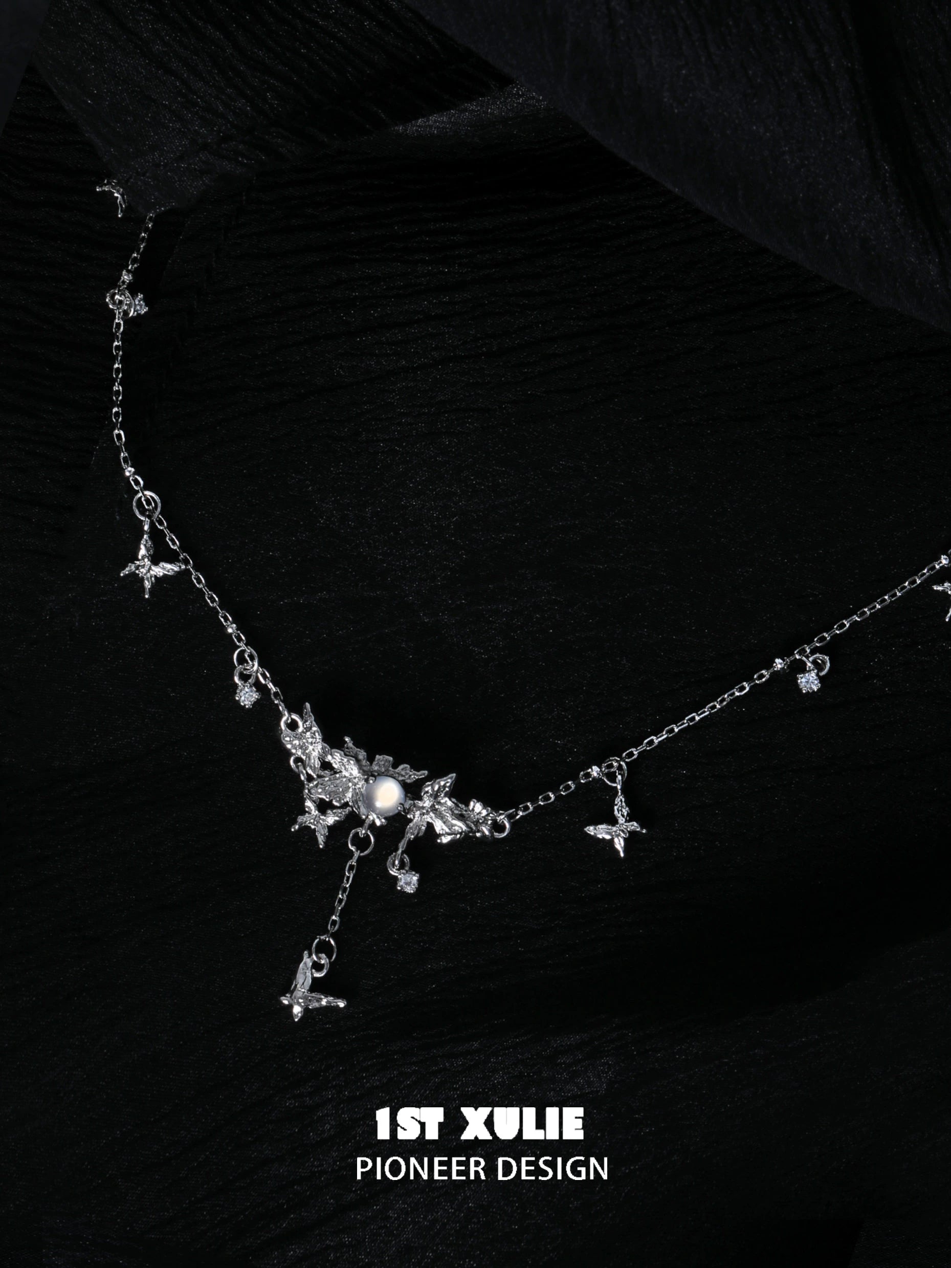 Mint butterfly necklace featuring elegant silver design with sparkling accents for a stunning look