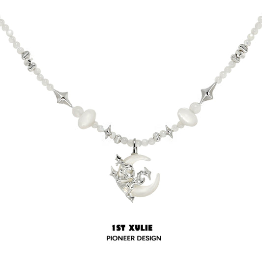 Moon beaded clavicle chain necklace featuring silver and white beads with a crescent moon charm