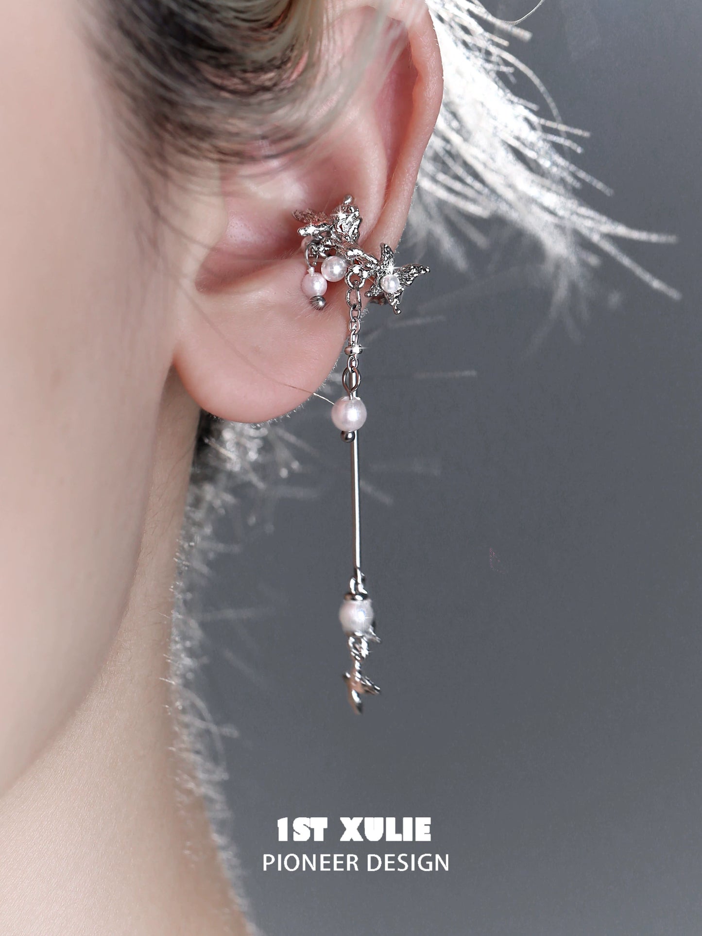 Elegant mystic butterfly ear clips with dangling pearls for a stylish accessory look