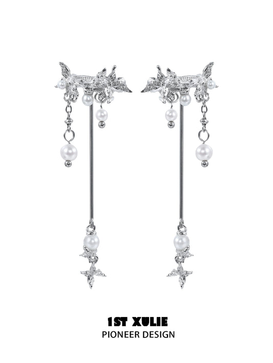 Elegant mystic butterfly ear clips with dangling pearls and intricate design from 1STXULIE