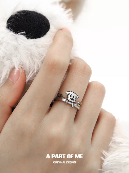 A PART OF ME office worker puppy ring featuring a cute dog design on a silver band