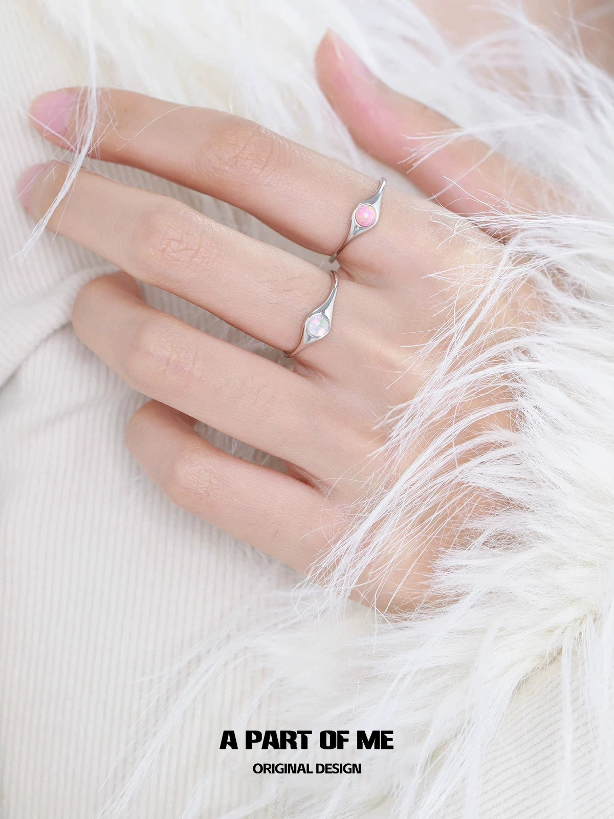 Elegant A PART OF ME opal color change ring displayed on a hand with stylish attire