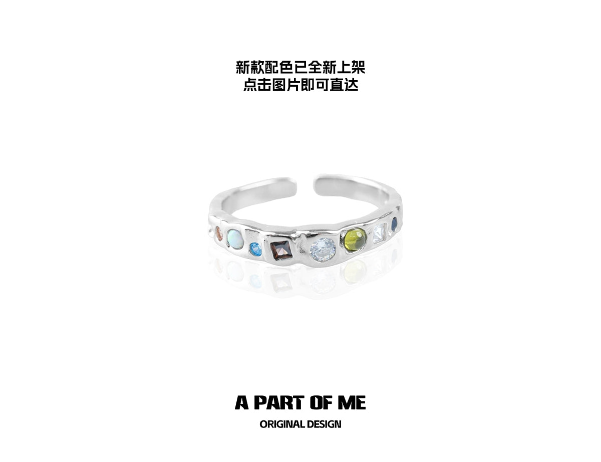 A PART OF ME colorful moonstone ring featuring multiple gemstones in a sleek silver band