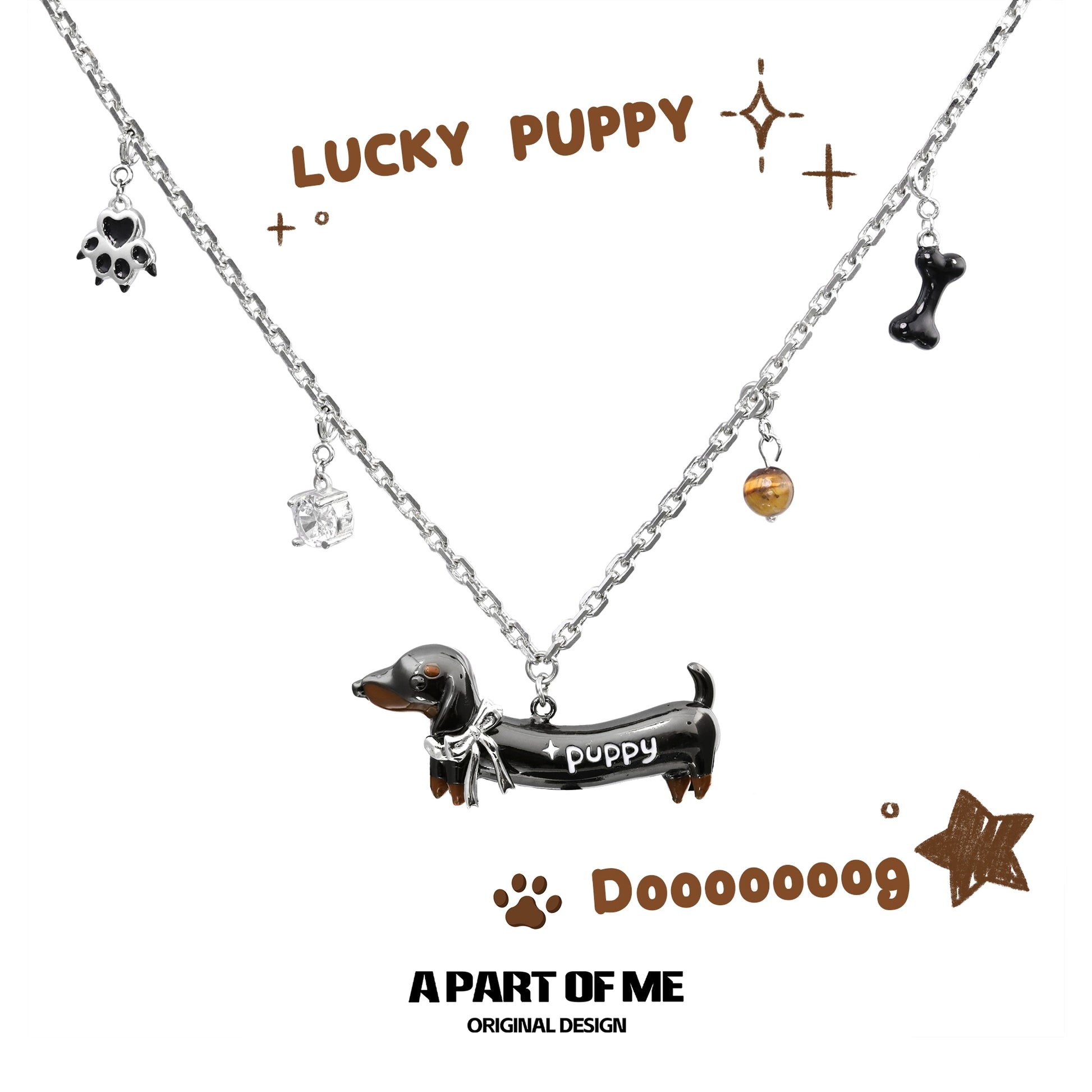 Lucky dachshund necklace with charms including a paw print and dog bone on a silver chain