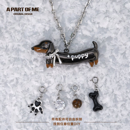 Lucky dachshund necklace featuring a charming dachshund pendant and four interchangeable charms