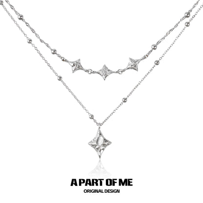 A PART OF ME starlight planet silver necklace with layered design and star charms