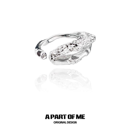 Unique symbiosis ring in silver featuring an intricate design with a polished finish