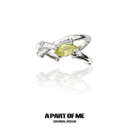 A PART OF ME silver ring featuring a yellow turquoise bamboo design with a unique shape