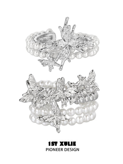 Elegant pearl butterfly ring with silver detailing and multiple pearl strands for a vintage look