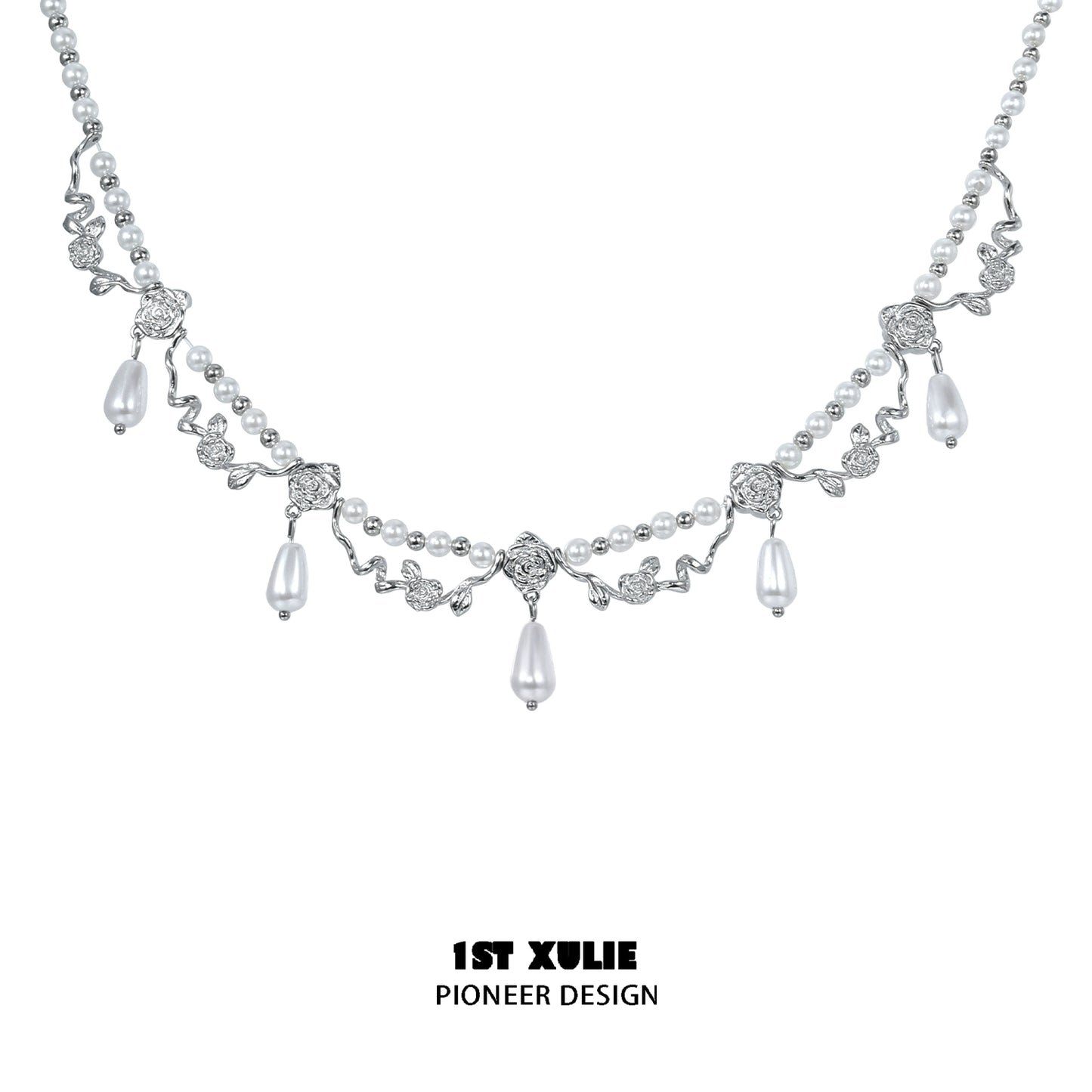 Elegant silver pearl clavicle necklace with intricate leaf design and dangling pearls