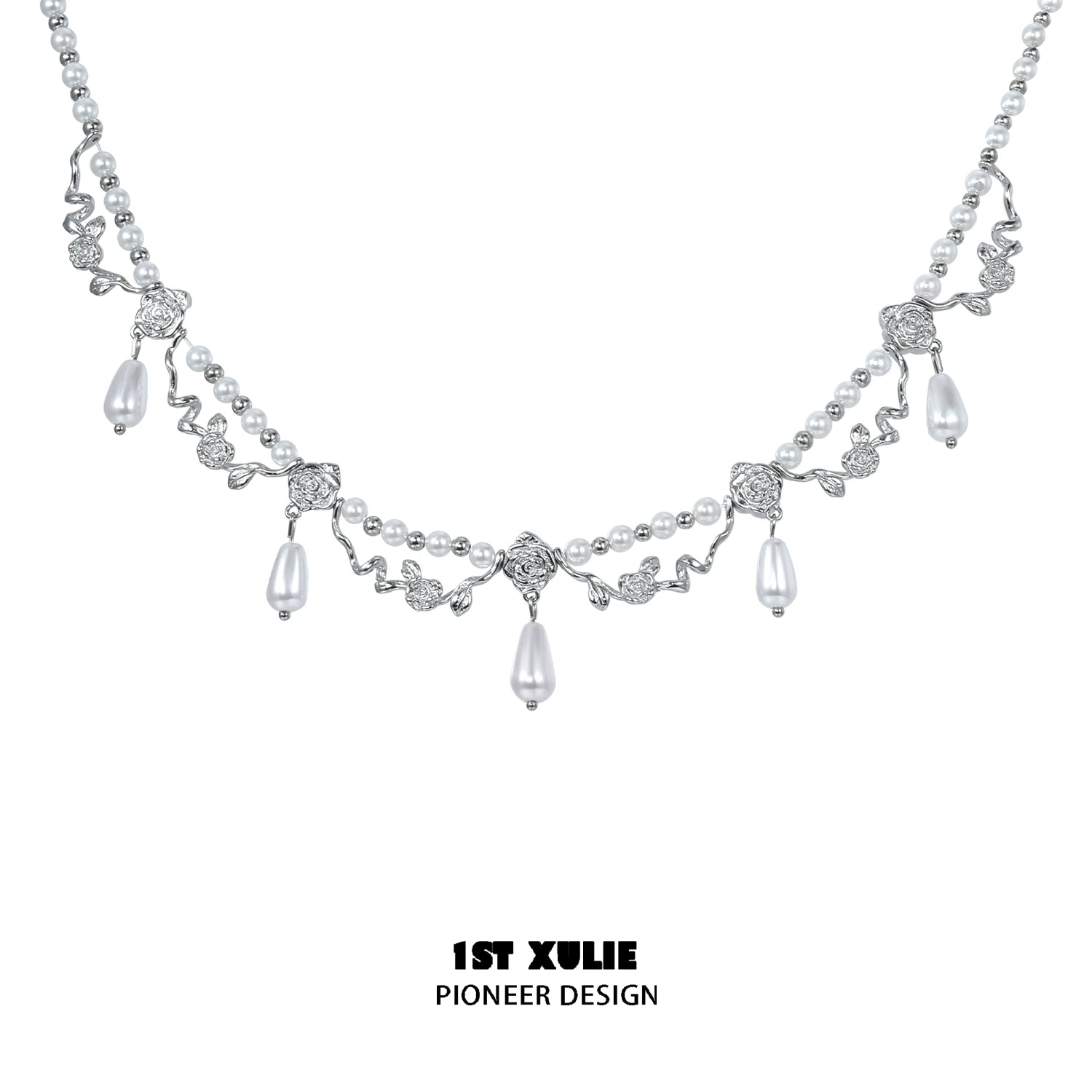 Elegant silver pearl clavicle necklace with intricate leaf design and dangling pearls