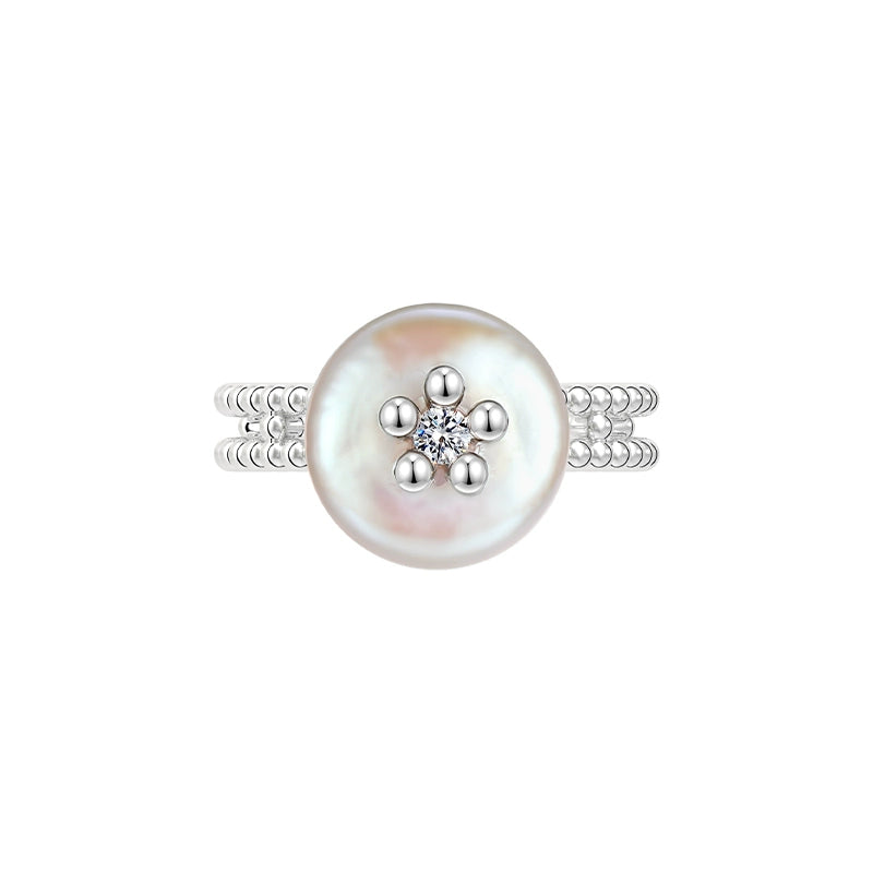 Elegant SUN HUNTER pearl riddle rings with a lustrous pearl and sparkling center design