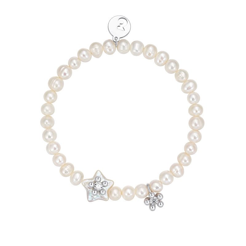 SUN HUNTER pearl star bracelet featuring freshwater pearls and a star charm for a stylish accessory