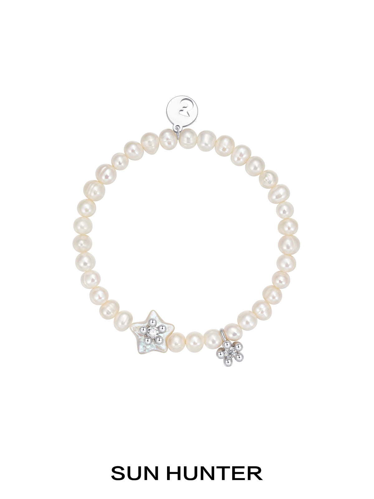 SUN HUNTER pearl star bracelet with natural pearls and star charms for elegant jewelry styling