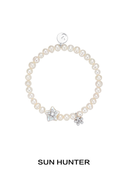 SUN HUNTER pearl star bracelet with natural pearls and star charms for elegant jewelry styling