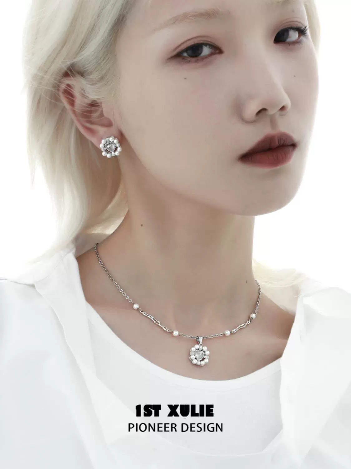 Elegant 1ST XULIE pearl statement necklace paired with matching earrings for a chic look