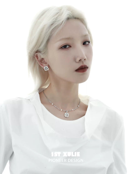 Elegant pearl statement necklace paired with matching earrings, perfect for stylish outfits
