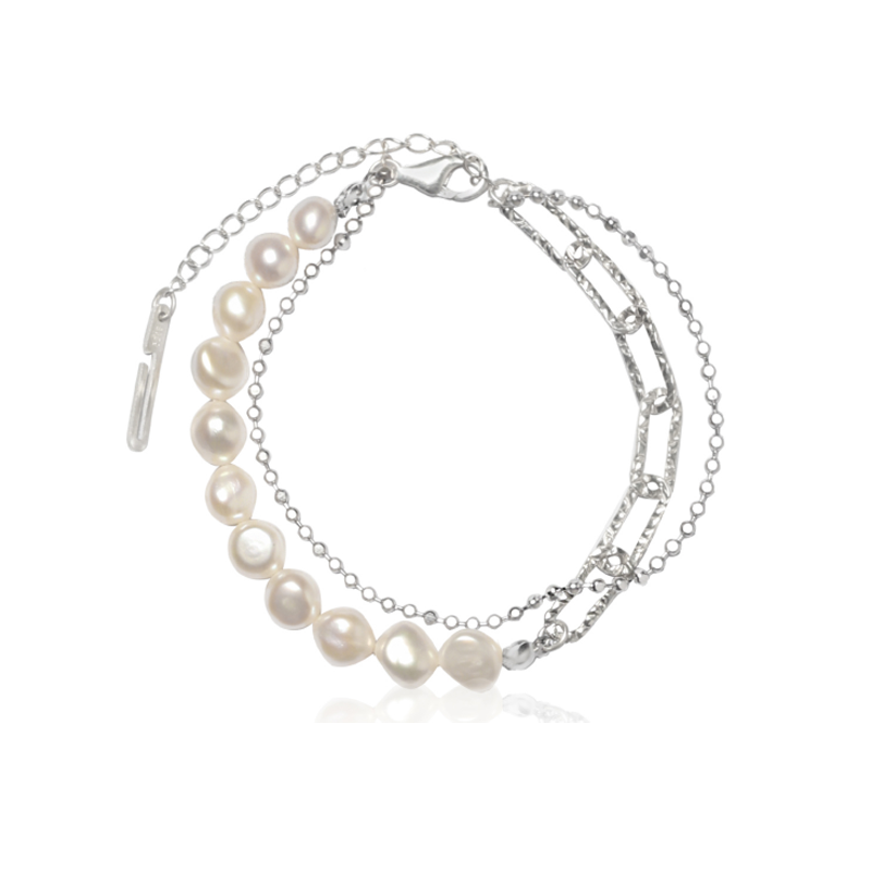 Elegant baroque pearl silver bracelet featuring lustrous pearls and delicate silver chain design