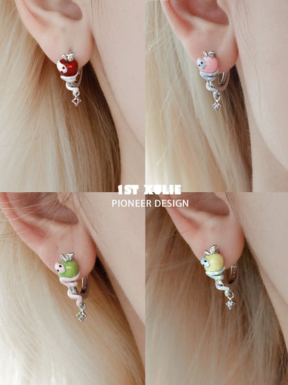 Colorful forbidden apple snake ear clip set featuring red, pink, green, and yellow designs