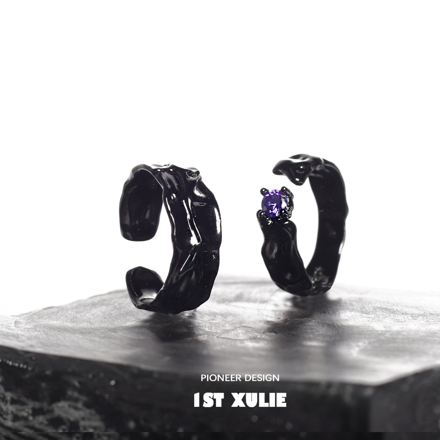 Y2K gothic couple rings in black with unique designs and a purple gemstone accent