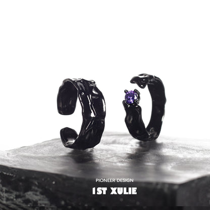 Y2K gothic couple rings in black with unique designs and a purple gemstone accent
