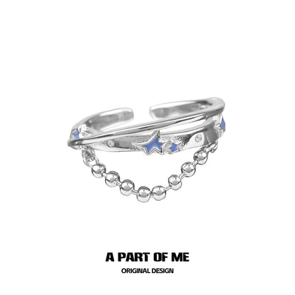 A PART OF ME planet chain ring featuring a sleek design with stars and shiny beads