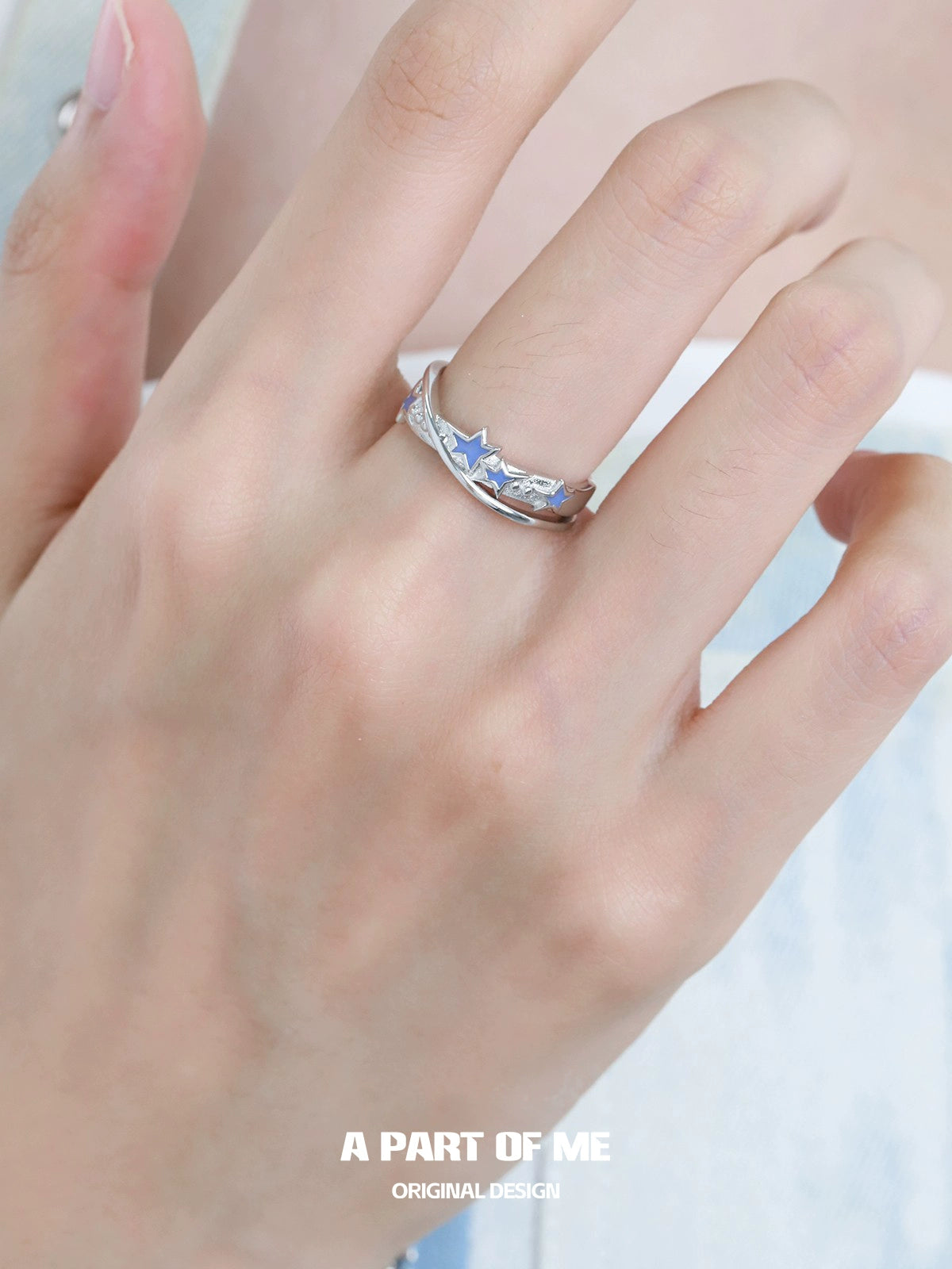 A PART OF ME planet chain ring in silver displayed on a hand for an elegant look