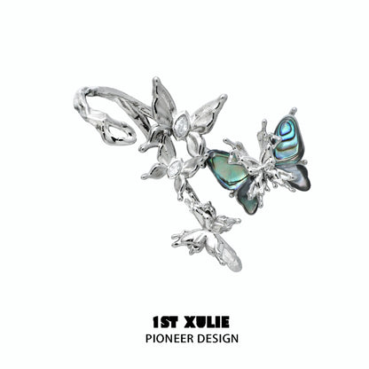 Silver punk butterfly ear clips featuring intricate floral design and colorful accents