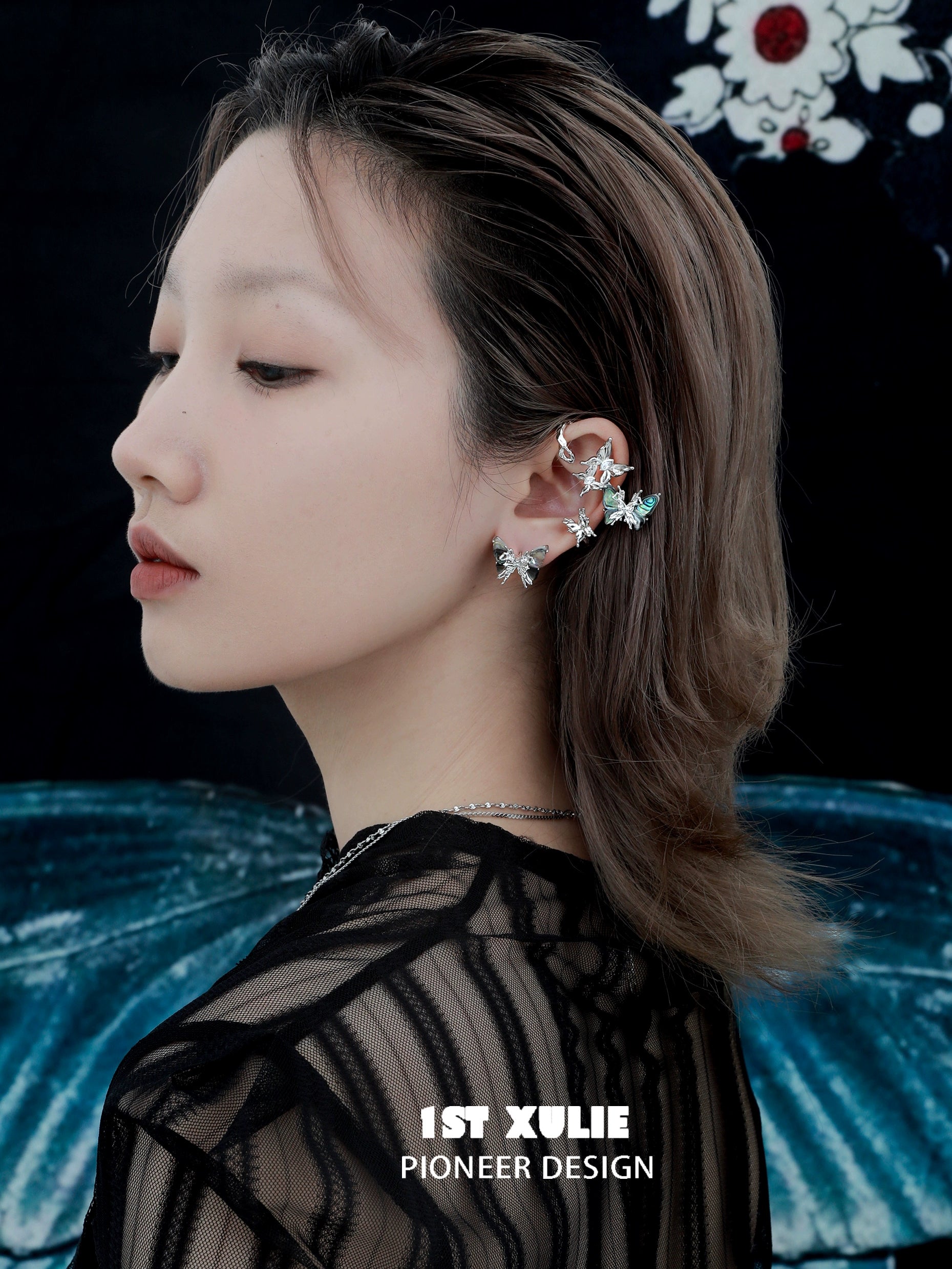 Stylish punk butterfly ear clips in silver, showcasing a unique design for edgy fashion lovers