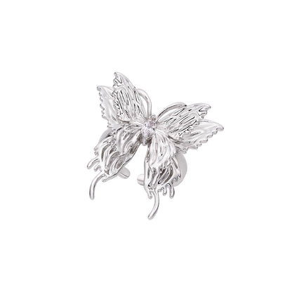 Stylish SUN HUNTER punk butterfly ear cuffs featuring intricate wing details and a sparkling center gem