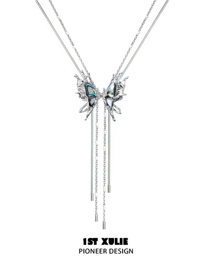 Punk butterfly necklace by 1ST XULIE featuring a unique design with colorful accents and silver chains